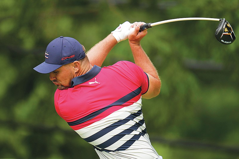 Bryson DeChambeau hits on the 17th hole during Thursday's first round of the U.S. Open at The Country Club in Brookline, Mass. (AP Photo/Julio Cortez)