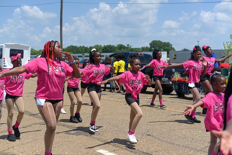 The Platinum Pressure Dolls perform during the Juneteenth parade Saturday, June 18, 2022, in downtown Texarkana. The parade was part of the Keeping History Alive Juneteenth Celebration. (Staff photo by Erin DeBlanc)