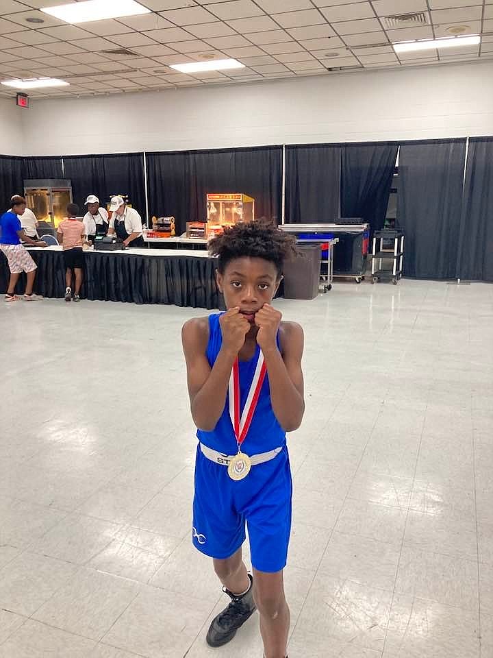 Fort Smith's Za'brion Jiles was named the Most Outstanding Boxer. Jiles won gold in the 70-pound Bantanmweight Division over Team Azeez's Amere Oliver.