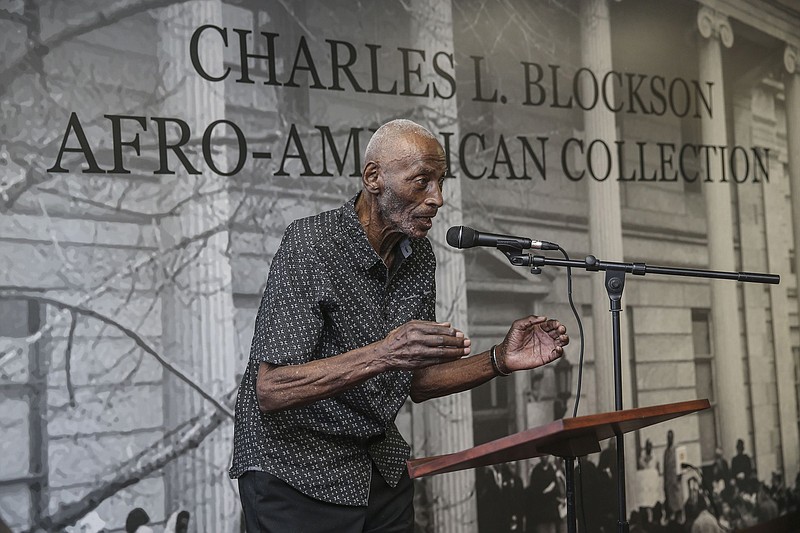 Charles L. Blockson addresses an audience at Centre Theater Gallery in Norristown, Pa., where some of the 700,000 items from his Afro-American collection are on display. (Philadelphia Inquirer/TNS/Steven M. Falk)