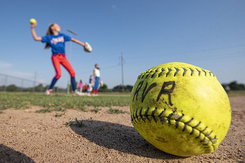 Players on the River Valley Rippers 12U softball team practice on Thursday, June 23, 2022, at the Ben Geren Softball Complex in Fort Smith. The Sebastian County Quorum Court approved an ordinance Tuesday appropriating more than $3.3 million for upgrades to the Ben Geren Softball Complex, as well as a new restroom at Torraine Lake. The upgrades to the softball complex include a project designed to resolve drainage issues present at the original eight fields there. Visit nwaonline.com/220626Daily/ for today's photo gallery.
(NWA Democrat-Gazette/Hank Layton)