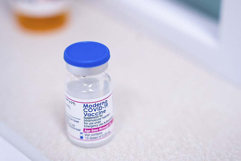 A vial of the Moderna covid-19 vaccination for children under 5 sits on a counter at Walgreens pharmacy Monday, June 20, 2022, in Lexington, S.C. Today marked the first day covid-19 vaccinations were made available to children under 5 in the United States. (AP Photo/Sean Rayford)