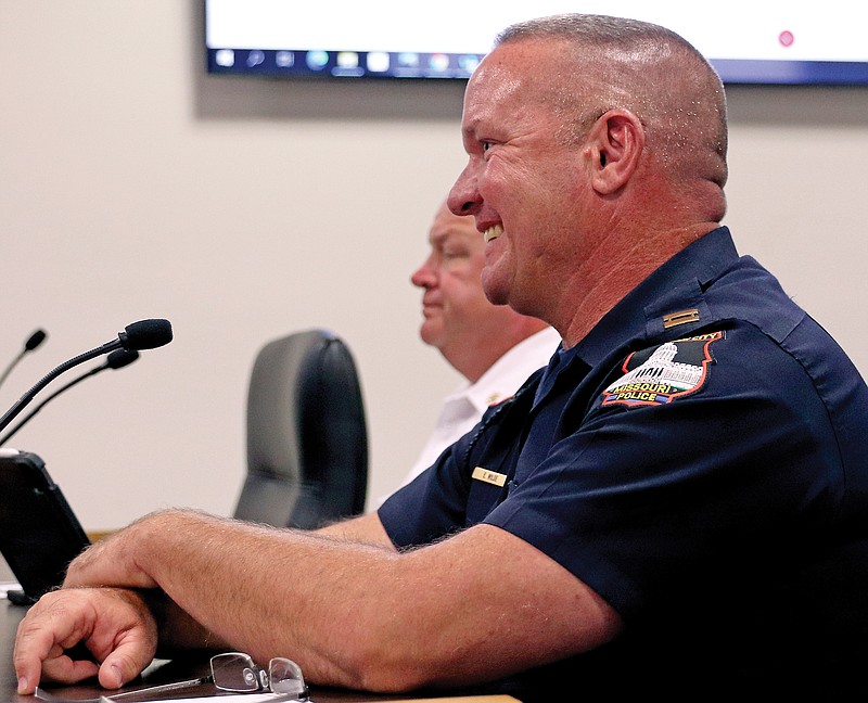 Eric Wilde smiles Tuesday, June 21, 2022, at City Hall after the City Council approves a motion to select him as the new police chief for the Jefferson City Police Department. (Kate Cassady/News Tribune photo)