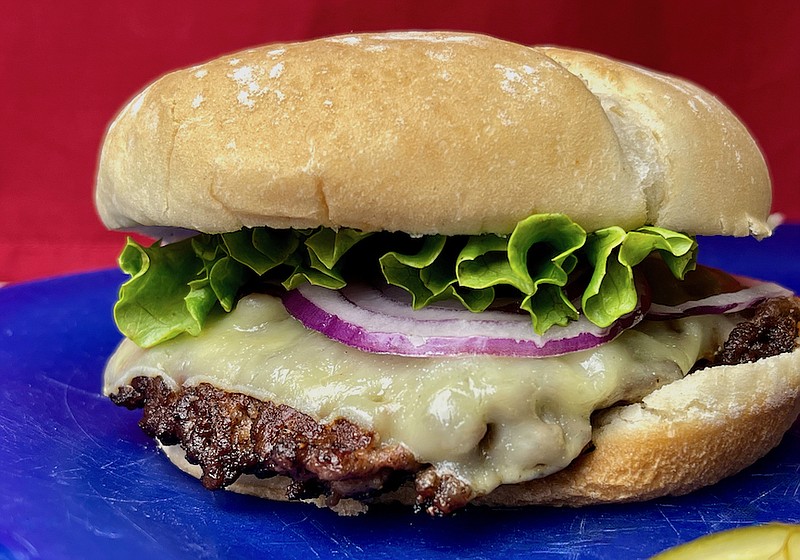 Smash Burger with cheddar, onion, lettuce and pickles. (Arkansas Democrat-Gazette/Kelly Brant)