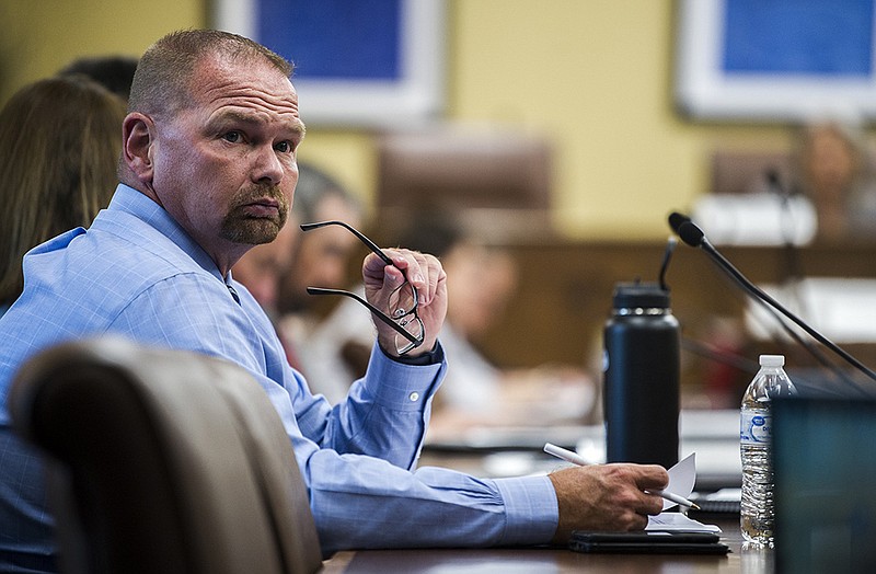 Chris Chapmond, Hot Springs chief of police, listens Tuesday to a presentation by Dr. Cheryl May, chair of the Arkansas School Safety Commission, during a meeting at the Arkansas State Capitol.

(Arkansas Democrat-Gazette/Stephen Swofford)