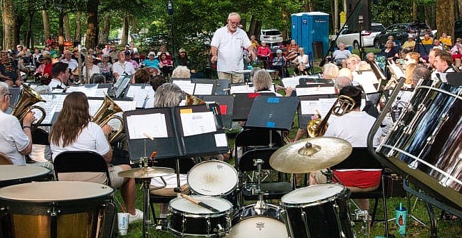Associate conductor Claude Smith leads the Hot Springs Concert Band during its June 13 concert in Whittington Park. Photo is courtesy of Joseph Dowden. - Submitted photo