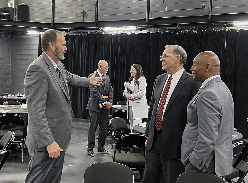 Bob Scott (left) director of the Arkansas Cooperative Extension Service, visits with Sen. John Boozman and Bruce McGowan, interim dean of the School of Agriculture, Fisheries and Human Sciences at the University of Arkansas at Pine Bluff, following a Farm Bill field hearing June 17 at Jonesboro. (Special to The Commercial/Mary Hightower, University of Arkansas System Division of Agriculture)