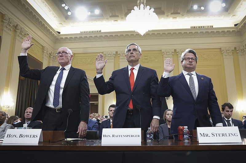 TNS
From left to right: Rusty Bowers, Arizona House speaker; Brad Raffensperger, Georgia secretary of state; and Gabriel Sterling, Georgia secretary of state chief operating officer, are sworn in prior to testifying during the fourth hearing on the Jan. 6 investigation in the Cannon House Office Building in Washington, D.C.