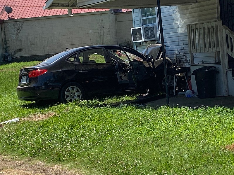 A vehicle that crashed into a house at Martin Luther King Jr. Boulevard and Ash Street is seen Monday, June 20, 2022, in Texarkana, Arkansas. The driver of the vehicle, Robert Miller, 37, of Texarkana, died Monday at a local hospital from a gunshot wound. Police allege Miller was shot by Trenkale Brunson, 29, who faces charges of first-degree murder, possession of a firearm by certain persons and unlawful discharge of a firearm from a vehicle. (Submitted photo)