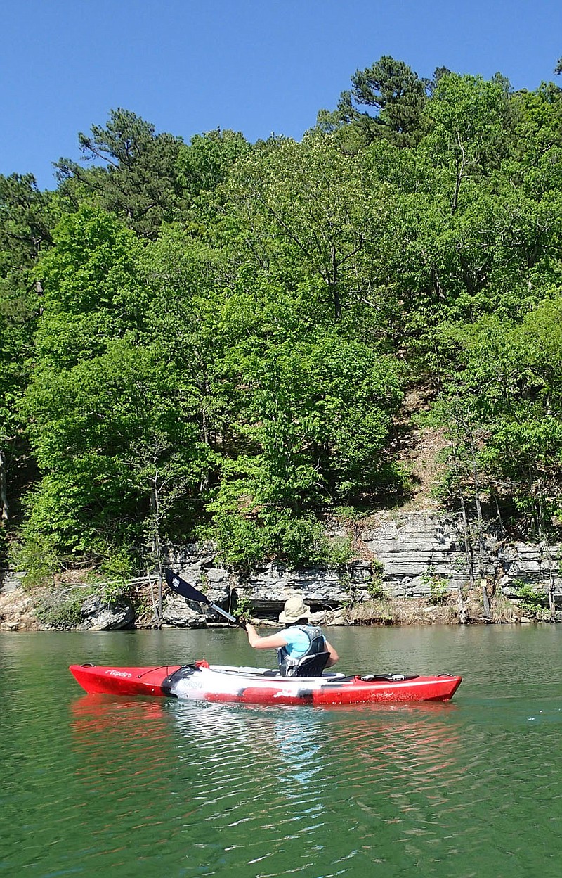 Cliffs and outcrops add to the scenery for kayakers in the Van Winkle Hollow arm of Beaver Lake.
(NWA Democrat-Gazette/Flip Putthoff)
