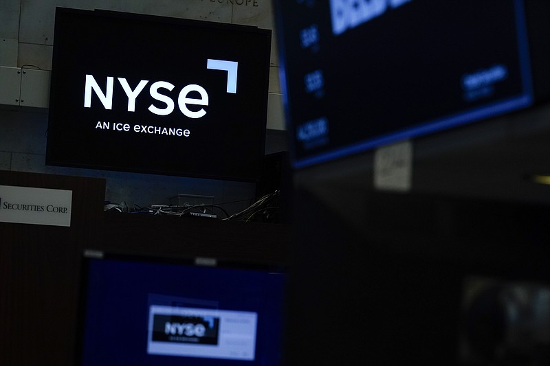 An NYSE sign is seen on the floor at the New York Stock Exchange in New York, Wednesday, June 15, 2022.  Stocks are opening higher on Wall Street Thursday, June 23.  The Labor Department said fewer Americans applied for jobless benefits last week as the U.S. job market remains robust. (AP Photo/Seth Wenig)