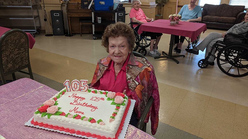 Audalie Nuckolls poses with her birthday cake. (Joshua Turner Banner News)