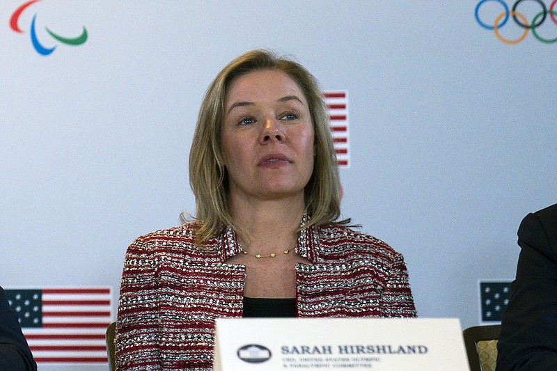 FILE - In this Feb. 18, 2020, file photo, United States Olympic and Paralympic Committee CEO Sarah Hirshland listens during a briefing with the U.S. Olympic and Paralympic Committee and Los Angeles 2028 organizers in Beverly Hills, Calif. At their keynote addresses at this week's annual assembly of U.S. athletes and administrators, both CEO Sarah Hirshland and chair Susanne Lyons said the federation's top-line priority for the upcoming year is on athlete excellence and expanding revenue. (AP Photo/Evan Vucci, File)