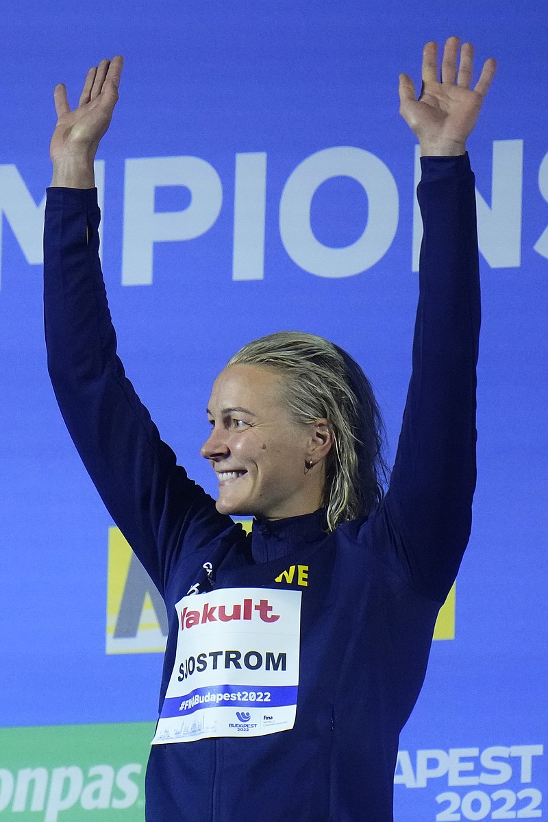 Sarah Sjostrom of Sweden celebrates after winning the women's 50m freestyle final at the 19th FINA World Championships in Budapest, Hungary, Saturday, June 25, 2022. (AP Photo/Petr David Josek)