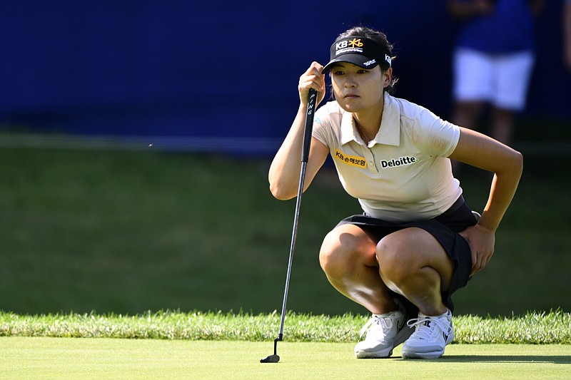 In Gee Chun lines up her putt on the 17th green during Saturday's third round in the Women's PGA Championship at Congressional Country Club in Bethesda, Md. (Associated Press)
