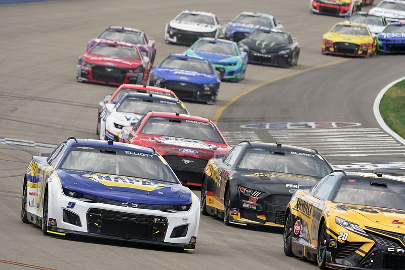 Chase Elliott (9) comes though a turn during a NASCAR Cup Series auto race Sunday, June 26, 2022, in Lebanon, Tenn. (AP Photo/Mark Humphrey)