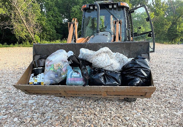 PHOTO PROVIDED BY BRANDON BAILES One of two loads of trash picked up from Anderson Beach on a single day. Bailes said the majority of the trash is alcohol bottles, which are not permitted on the property.