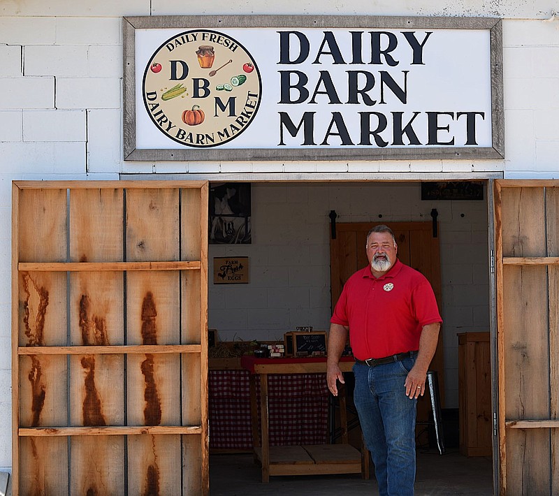 Special to the Eagle Observer/Brook Bereznicki
Bryan Austin stands in the doorway of the Dairy Barn Market in rural Decatur.
