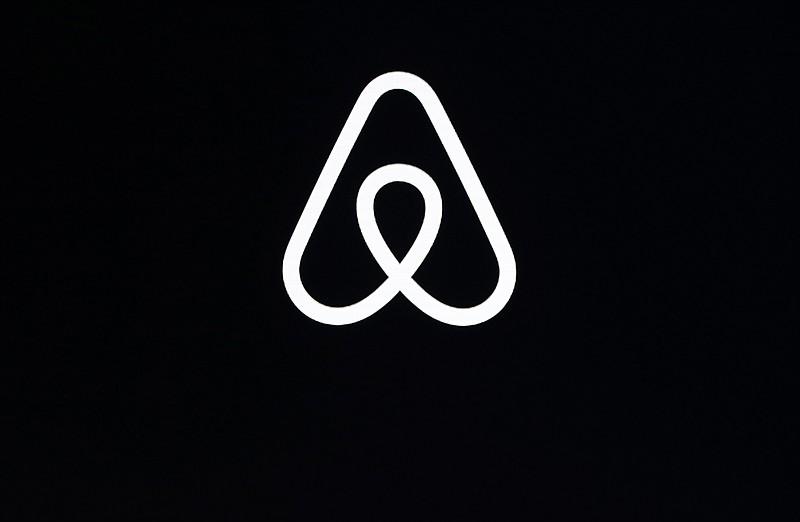 FILE - This Feb. 22, 2018, file photo, shows an Airbnb logo during an event in San Francisco. Airbnb says it’s making its party ban permanent. The short-term-rental company said Tuesday, June 28, 2022 that the temporary ban it put into effect in 2020 is working, so it decided to make it permanent. (AP Photo/Eric Risberg, File)