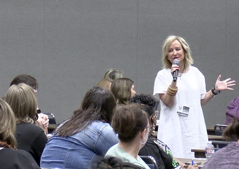 Arkansas Tech University associate professor and counseling program director Pam Dixon speaks to a large crowd at the Hot Springs Convention Center on Wednesday. - Photo by Donald Cross of The Sentinel-Record