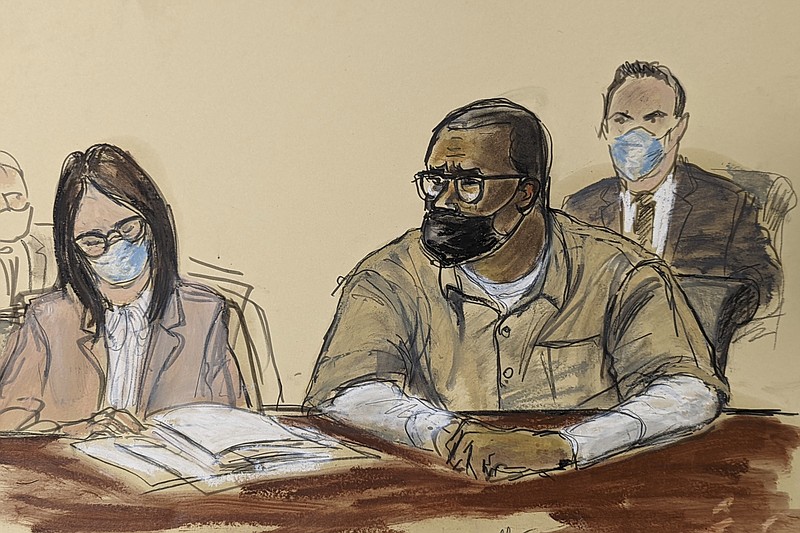 In this courtroom sketch, R. Kelly and his attorney Jennifer Bonjean, left, appear during his sentencing hearing in federal court, Wednesday, June 29, 2022, in New York. The former R&amp;B superstar was convicted of racketeering and other crimes. (AP Photo/Elizabeth Williams)