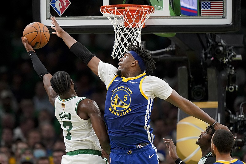 Boston Celtics guard Jaylen Brown (7) puts up a shot against Golden State Warriors center Kevon Looney (5) during the NBA Finals June 16 in Boston. - Photo by Steven Senne of The Associated Press