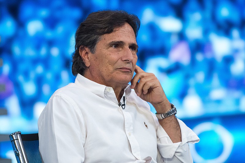 Three-time world champion Formula One racer Nelson Piquet of Brazil attends the shooting of the Hungarian Television's Formula One magazine on July 23, 2015, in Budapest, Hungary. Piquet apologized to Lewis Hamilton on Wednesday saying the racial term he used about the Mercedes driver was “ill thought out” but was not meant to be offensive. The 69-year-old Brazilian has faced heavy criticism this week over comments he made in Portuguese last November on a podcast where he referred to Hamilton as “neguinho,” which means “little Black guy.” - Photo by Janos Marjai of MTI via The Associated Press