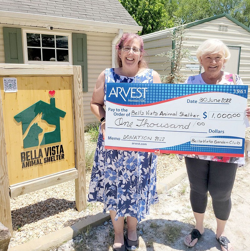 Pat Meyer, president of the Bella Vista Garden Club (right), presents Nancy Cullins of the Bella Vista Animal Shelter with a check for $1,000. The donation was made possible by proceeds from the club’s two plant sales and garden walk extravaganza. The club also donated to the Bella Vista Courtesy Van, Bella Vista Community Television, the Bella Vista Public Library, the Bella Vista Historical Museum and Pedal It Forward, along with scholarships to horticulture students at the University of Arkansas totaling $9,500.

(Courtesy photo)