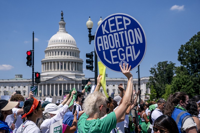Abortion-rights activists demonstrate against the Supreme Court decision to overturn Roe v. Wade that established a constitutional right to abortion, on Capitol Hill in Washington, Thursday, June 30, 2022. (AP Photo/J. Scott Applewhite)