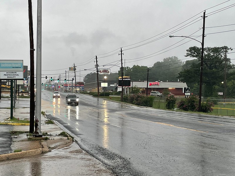 Heavy rains - up to 9 inches - fell on parts of Union County Sunday. North West Avenue in El Dorado was passable around 11:30 a.m. (Matt Hutcheson/News-Times)