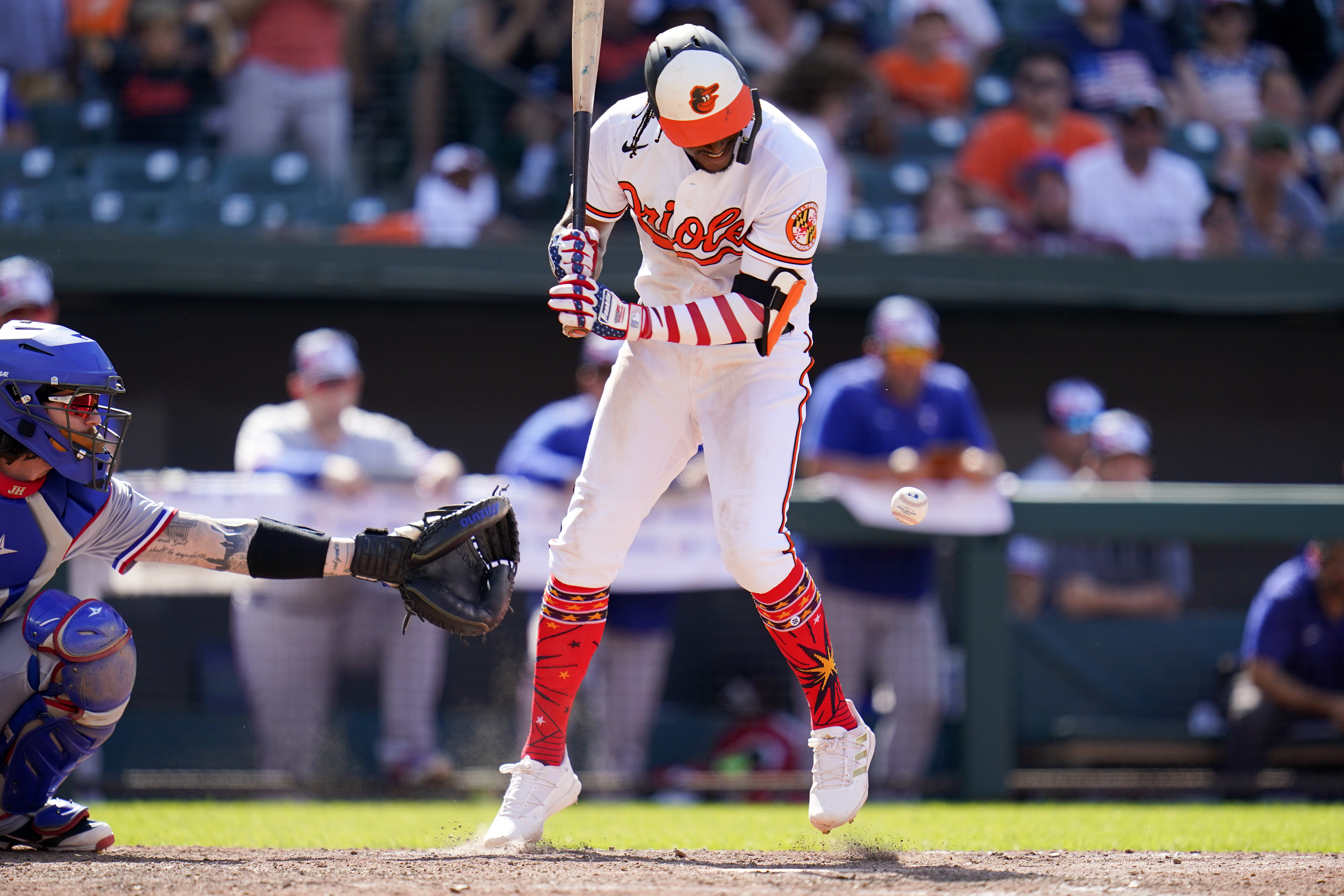 Baltimore Orioles' Jorge Mateo, left, reacts while running by