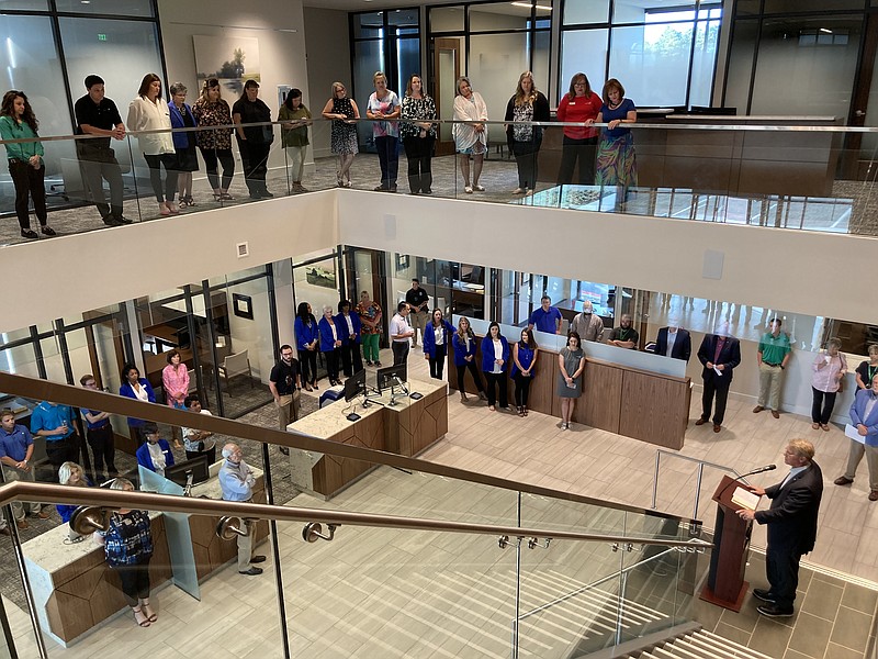 Chuck Morgan, chairman and CEO of Relyance Banks, makes remarks to employees on Tuesday morning as the bank opened its new headquarters in White Hall. (Pine Bluff Commercial/Byron Tate)