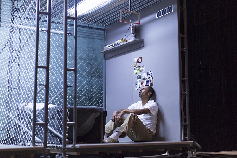 An inmate languishes in solitary confinement in a 6-by-9 cell in the 2016 world premiere of "The BOX" at Z Space in San Francisco. (Special to the Democrat-Gazette)