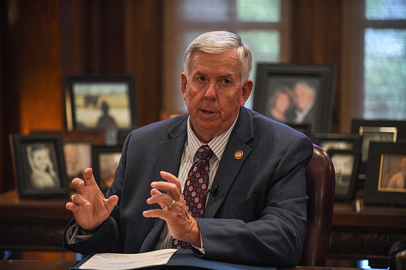 As Missouri Gov. Mike Parson prepares to sign SB 820, he talks about the importance of having access to internet, especially high-speed internet anywhere in the state, rural as well as urban areas. He said that he thought this legislation would help make that reality. (Julie Smith/News Tribune photo)