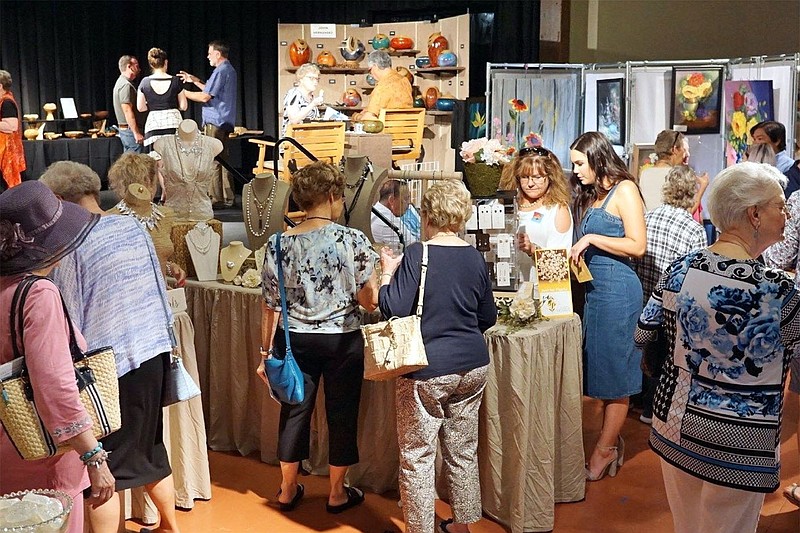 Guests wander the 2019 Art on the Border sale. With 1,200 people who attended and $42,000 raised for nonprofit organizations, it was the largest year of the event to date. Organizers expect this year to top the 2019 show.

(Courtesy Photo)