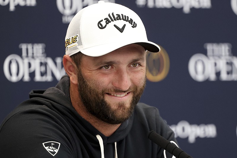 Spain's golfer Jon Rahm sp[eaks during a press conference at the British Open golf championship in St Andrews, Scotland, Tuesday, July 12, 2022. The Open Championship returns to the home of golf on July 14-17, 2022, to celebrate the 150th edition of the sport's oldest championship, which dates to 1860 and was first played at St. Andrews in 1873. (AP Photo/Peter Morrison)