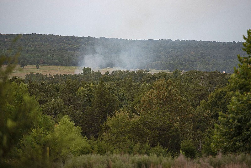 Smoke rises from a grass fire Tuesday in Greenwood. Visit nwaonline.com/220713Daily/ for today's photo gallery.
(NWA Democrat-Gazette/Hank Layton)