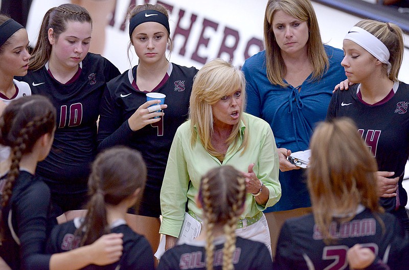File Photo/NWA Democrat-Gazette
Rose Cheek-Willis, former Siloam Springs head coach, talks to her players during a timeout on in a match against Greenwood during the 2016 season. Cheek-Willis coached at Siloam Springs for 36 seasons and Friday will be inducted into the Arkansas High School Coaches Association Hall of Fame.