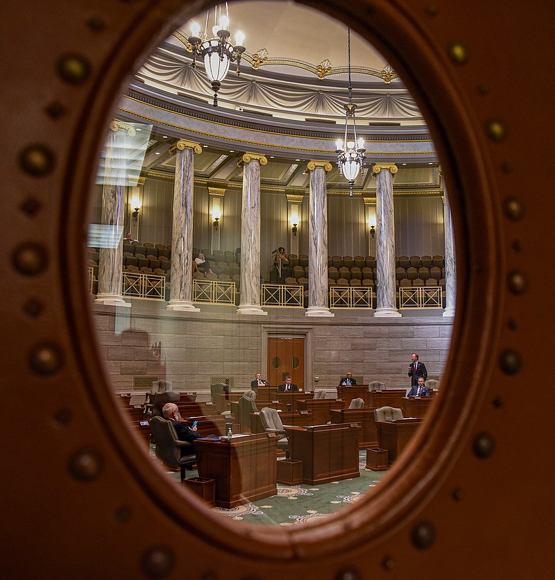 Shown through the window are a few senators who delivered speeches about Senate tradition, honor and honesty during Wednesday, Jan. 5, 2022, opening session of the 101st Missouri General Assembly at the state Capitol in Jefferson City. (Julie Smith/News Tribune File Photo Jan. 2022)