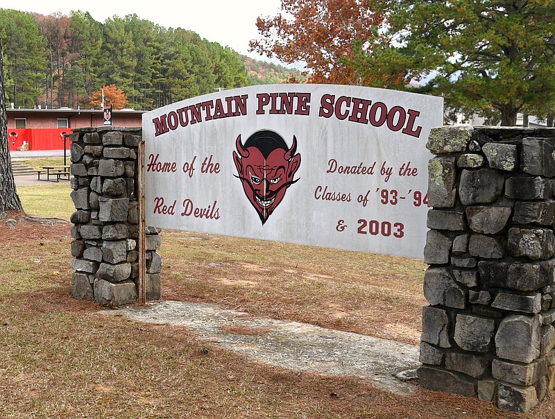 A sign on the Mountain Pine School campus. - File photo by The Sentinel-Record