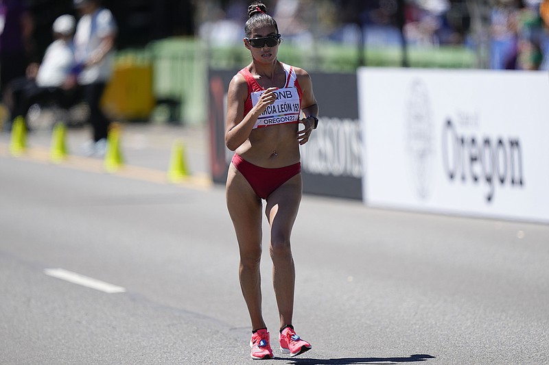 Kimberly Garcia Leon, of Peru, competes in the final in the women's 20km race walk at the World Athletics Championships Friday, July 15, 2022, in Eugene, Ore. (AP Photo/Gregory Bull)