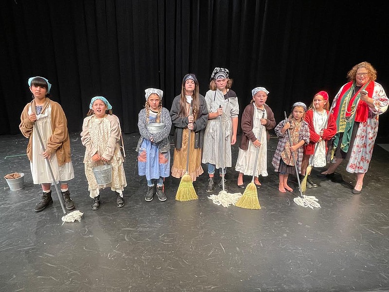 The ensemble of orphans in the Fort Smith Little Theatre production of “Annie” includes Zenie Jo Basham as Molly, Nora Giani as Kate, Ellie Chivington as Tessie, Isabella Ree as Pepper, Rachel Espinoza as July, Allison Jones as Duffy and Montana Berkley and Maribette Holmes as additional orphans. Charlotte Scott portrays the evil Miss Hannigan.

(Courtesy Photo)