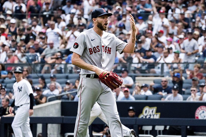 Boston Red Sox starting pitcher Chris Sale walks off the mound after a hand injury during the second inning of a baseball game against the New York Yankees, Sunday, July 17, 2022, in New York. (AP Photo/Julia Nikhinson)