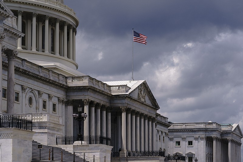An American flag blows in the wind as it flies about the U.S. Capitol in Washington, Monday, July 18, 2022. (AP Photo/J. Scott Applewhite)