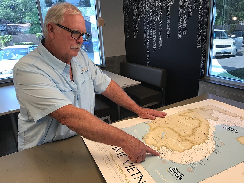 Thomas Morrissey of Texarkana points to a location on a map where his Army combat unit was stationed in Vietnam during the Vietnam War. Morrissey was a Huey helicopter pilot. (Staff photo by Greg Bischof)