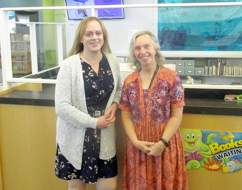 Marc Hayot/Siloam Sunday Library Manager Dolores Deuel (right) retired from the Siloam Springs Public Library on Friday. Stephanie Freedle became the new library manager and will continue to take the library forward.