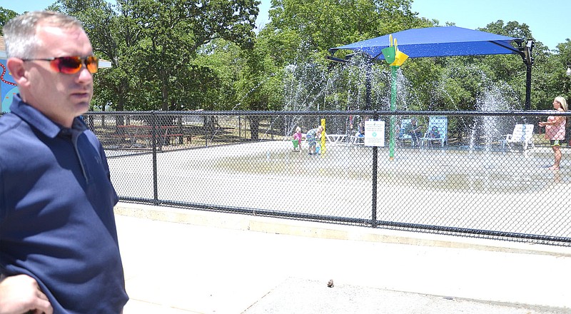 Children find relief from the summer heat playing in the water at the city’s splash pad at City Park. Equipment at the splash pad was damaged recently, according to Nathan See, city Street Department superintendent. Repairing or replacing the equipment is costly.

(NWA Democrat-Gazette/Annette Beard)