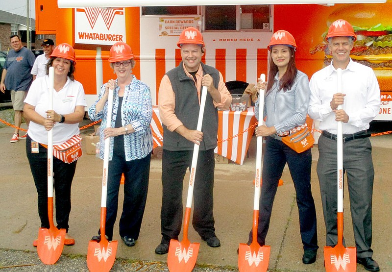 Marc Hayot/Siloam Sunday

Mayor Judy Nation (second from left) prepares to break ground on the new Whataburger located at the intersection of Arkansas Highway 16 East and U.S. Highway 412 East, with Amy Henderson (left), field brand development coordinator; operating partner Alex Addison; Isabel Saucedo, area coach of the Northwest Arkansas Whataburgers; and Chamber president Arthur Hulbert. Whataburger will begin by demolishing the old Kenny’s Automotive garage next week. With construction delays, Whataburger plans to, hopefully, have the Siloam Springs location open by winter, Henderson said.