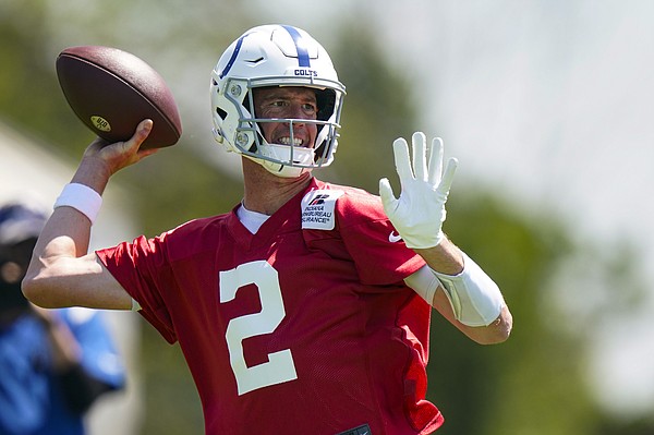 Indianapolis Colts quarterbacks, from left, Matt Ryan, Nick Foles, Sam  Ehlinger and Jack Coan drop back to throw during practice at the NFL team's  football training camp in Westfield, Ind., Thursday, July