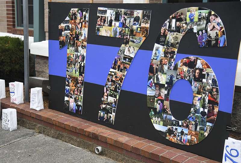 A memorial for Cpl. Brent Scrimshire is shown at the Hot Springs Police Department on March 10, 2021, the one-year anniversary of his death. - File photo The Sentinel-Record